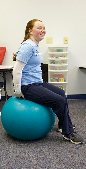 Teen patient engaged in occupational therapy at KidsLink Neurobehavioral Center near Cleveland