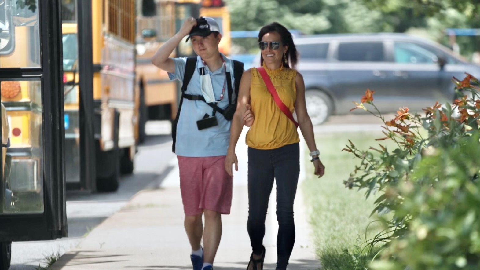 Parent walking with child on the way out of school