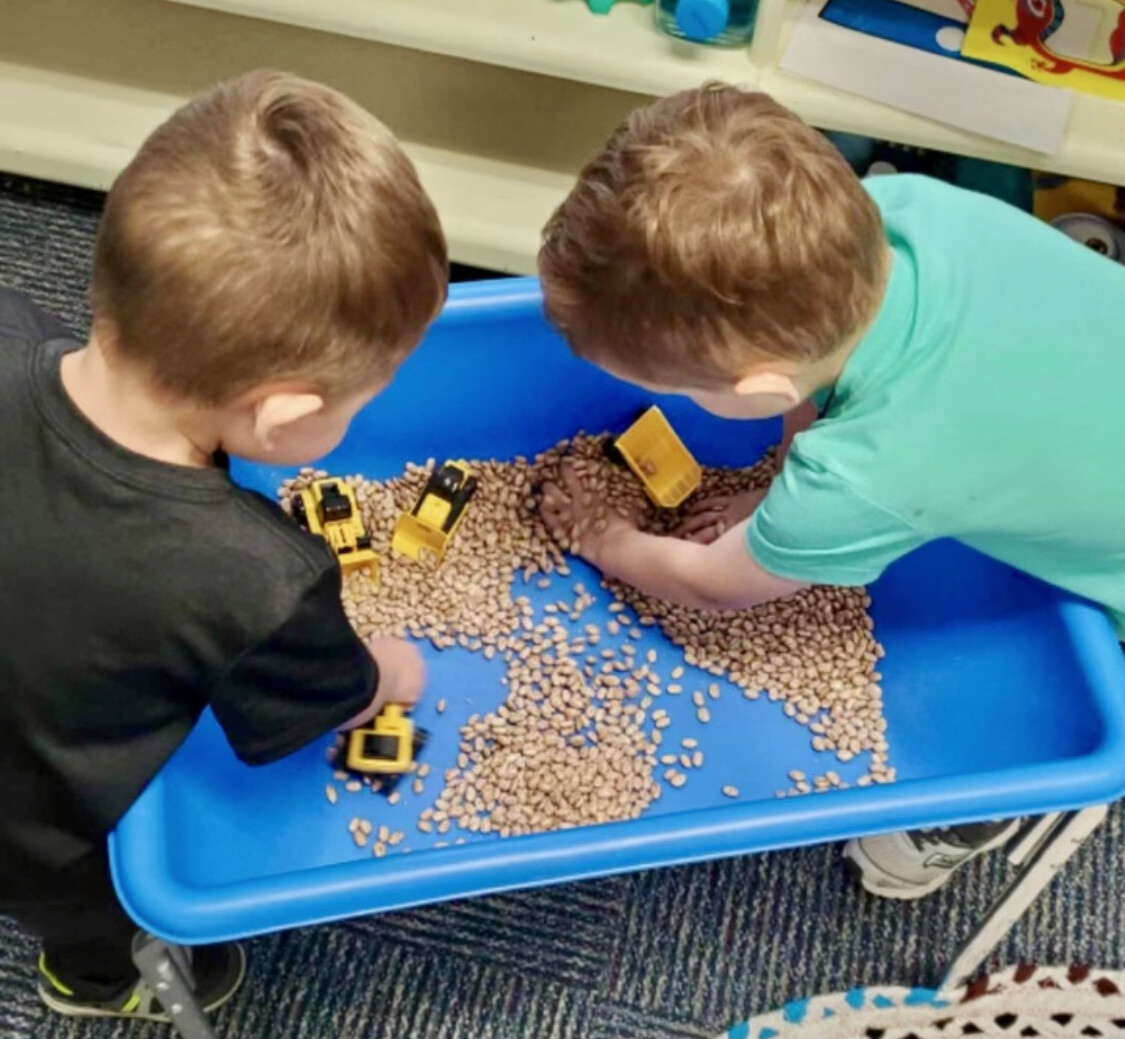 Two kids engaged in play at the KidsLink Neurobehavioral Center near Cleveland